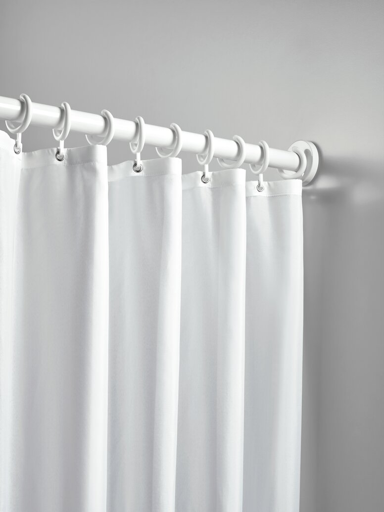 Shower curtain on a shower rail white