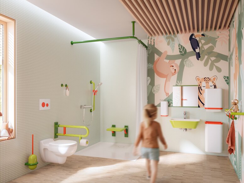 Colorful and child-friendly bathroom equipped with sanitary accessories in shades of green, white and coral