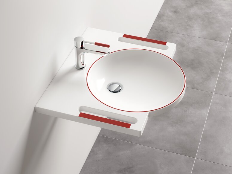 Lavabo et robinetterie avec couleurs contrastées rouges pour les personnes atteintes de démence