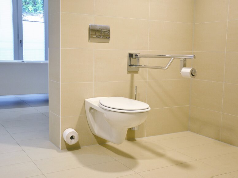 Toilet equipped with folding support handle, spare paper holder and toilet brush set