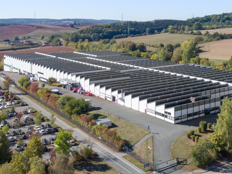 Drone image of the HEWI plant with white façade