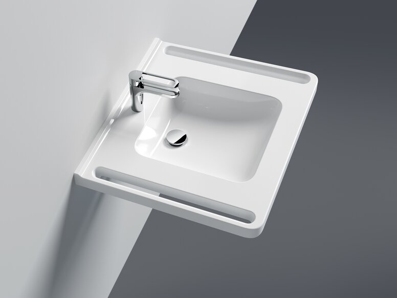 lavabo avec poignées latérales intégrées et robinetterie monocommande en chrome