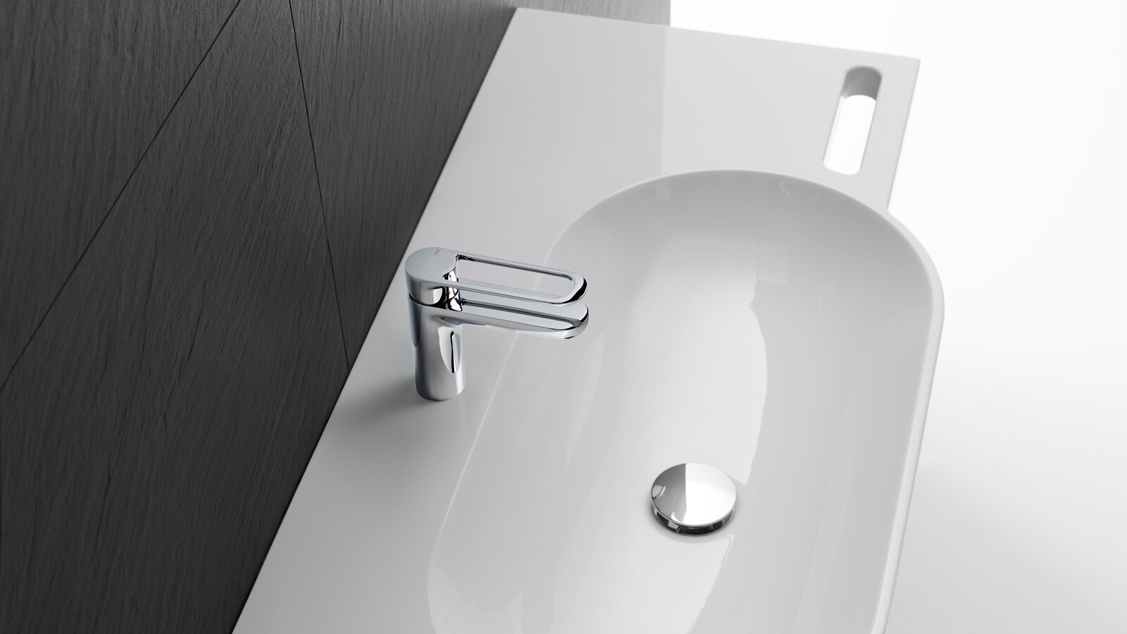 Variable-length washbasin with grab rails and single-lever mixer in chrome